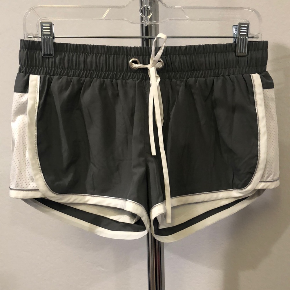Bebe sport running shorts, rhinestone wings